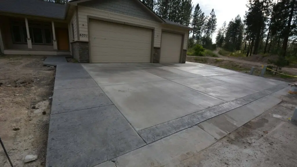 stamped concrete border Dundee Concrete and Landscaping stamped concrete border